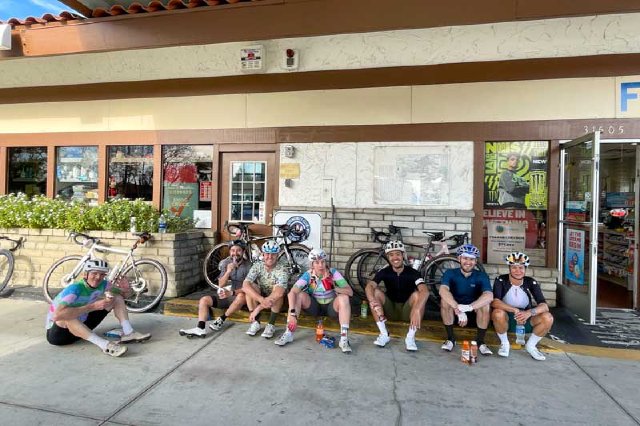 Cyclists eating snacks at a gas station in Westlake Village, CA